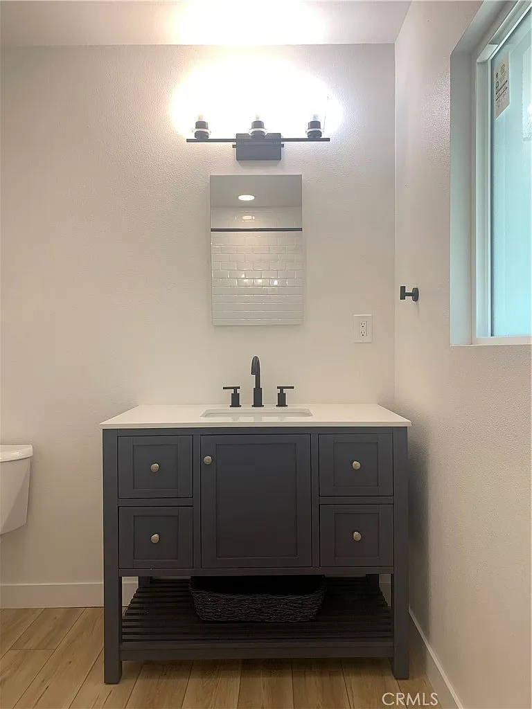 Bathroom with gray vanity