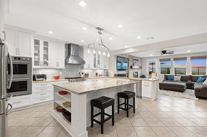 large modern kitchen with a large Kitchen island 